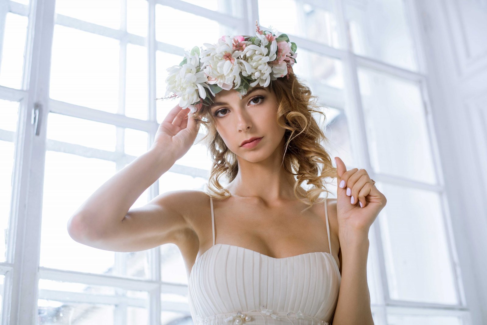 brunette-bride-in-fashion-white-wedding-dress-with-PA5QKFF-scaled.jpg